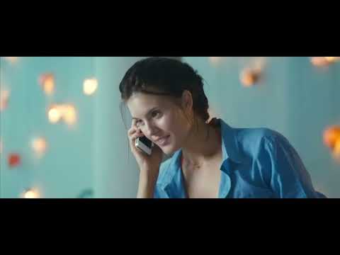 Taken 2 official trailer still — Bryan Mills framed against Istanbul skyline at dusk