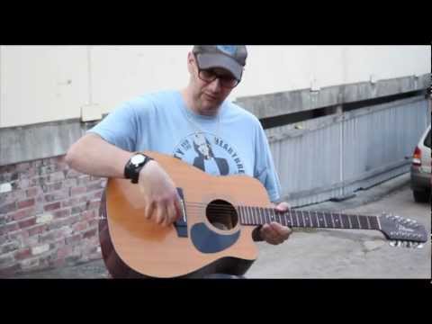 Michael Carpenter discusses his old 12 string acoustic guitar and gives us a lesson...