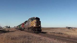 preview picture of video 'Eastbound KCS Grain Train with ACe Leader West of Postville, IA'