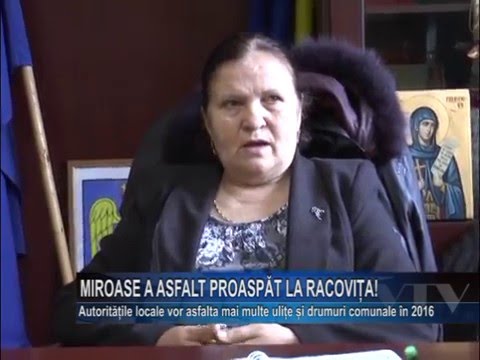 Miroase a asfalt proaspat la Racovita