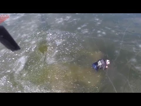 Drone captures snowmobile breaking through ice