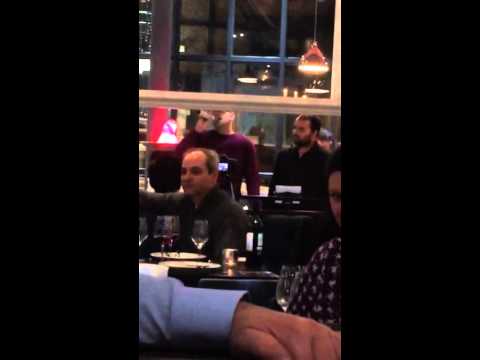 Guy gets up to sing in restaurant