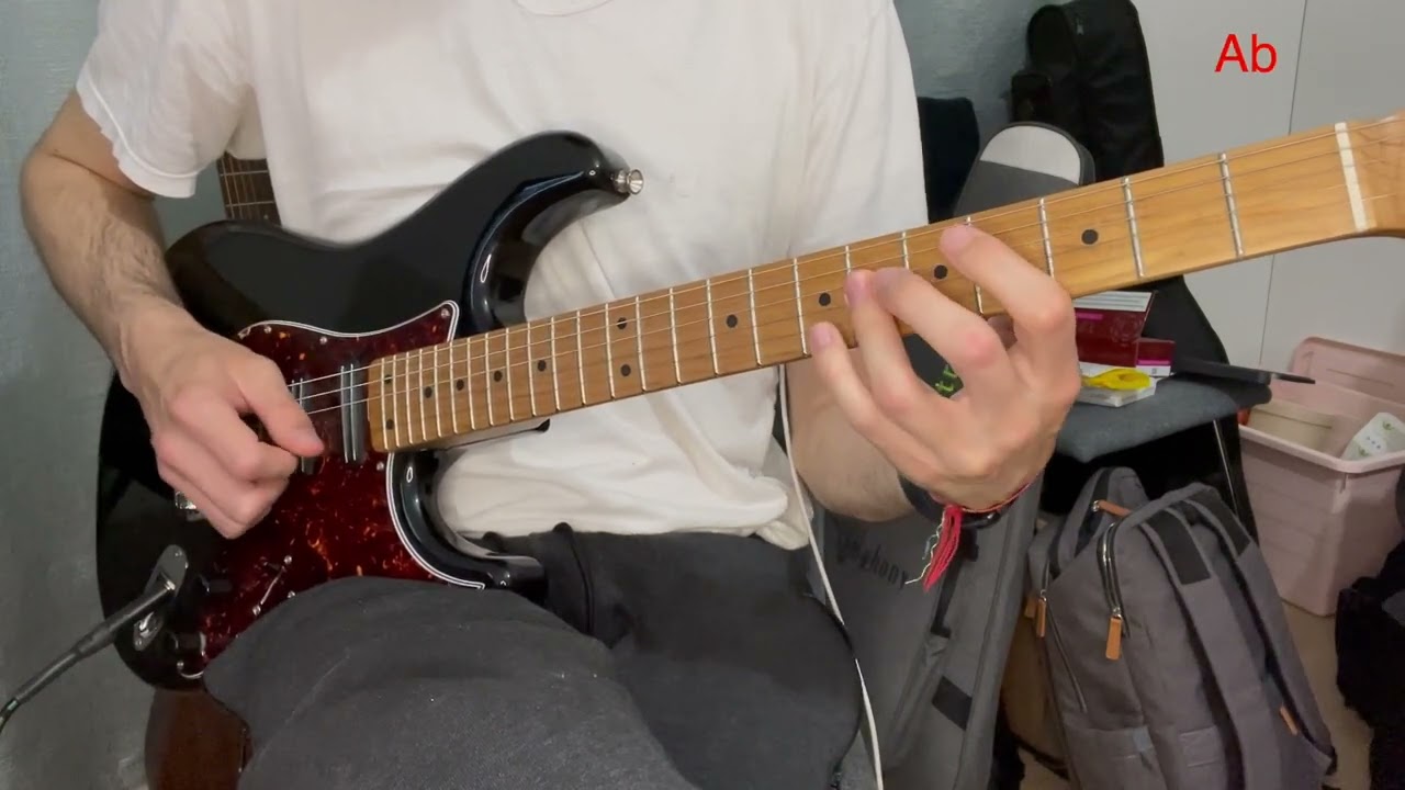Roberto Barlocci playing perfect fourth intervals on guitar in a voice-leading exercise