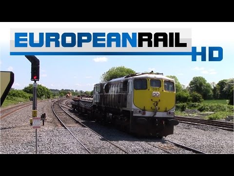 Iarnród Éireann Irish Rail 071 loco 083 + Wheelset Train passes Portarlington Station