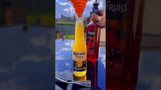 Corona Sunrise 🍺🌅 Corona / Tequila / Orange Juice / Grenadine #coronasunrise #coronabeer #tequila