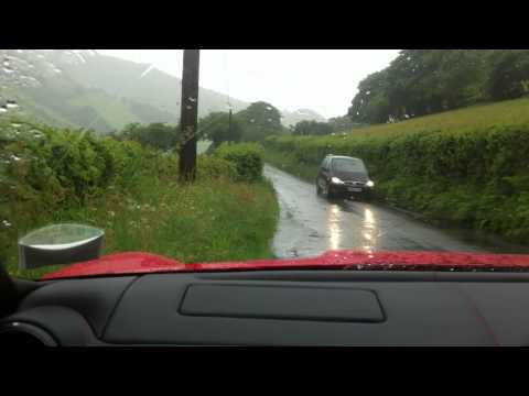 Ferrari 599 GTB Fiorano on wet roads in the countryside. V12 all the way!
