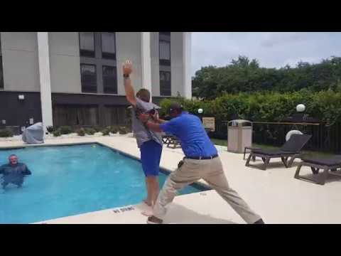 Hampton Inn Goldsboro Team throws Managers in the pool