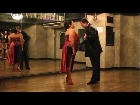  María del Carmen Romero  and  Jorge Dispari  are  dancing  to  the  milonga  "  Cacareando  "
