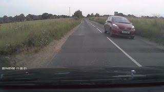 preview picture of video 'Woman Driver Distracted - With Doing Her Hair.'