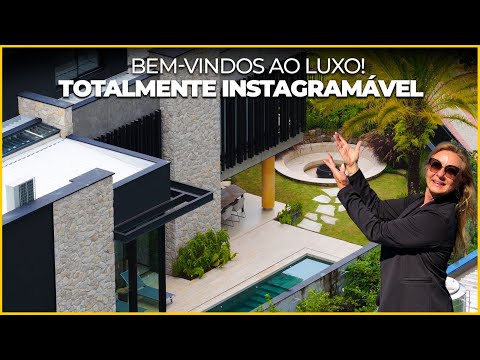 Casa contemporânea com 4 suítes e arquitetura autoral à venda no Itahyê, Alphaville