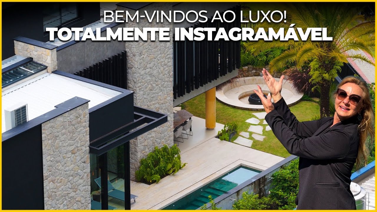Casa contemporânea com 4 suítes e arquitetura autoral à venda no Itahyê, Alphaville