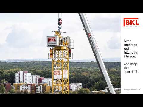 Kranmontage auf höchstem Niveau: 200-Metertonnen-Obendreher auf einem Hochhausdach in Wolfsburg.