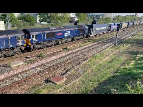 DRS Class 66426 + Class 66421 with containers pass Darlington on Daventry to Mossend 25/04/20
