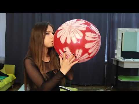 Goth Girl Blow to pop A red Balloon