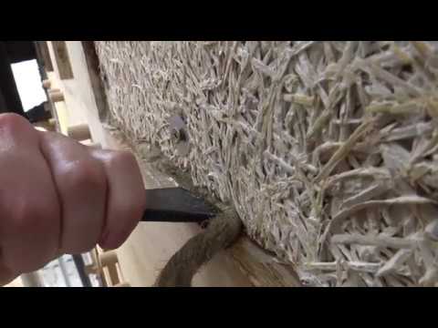 Using oakum caulking to seal infill panels on timber frame