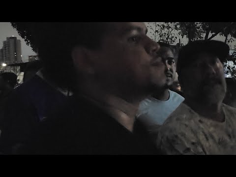 Tocando na Porta do Cemitério da Vila Formosa em plena sexta feira da Paixão