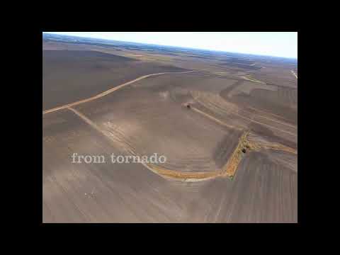 Aerial back track of the March 21st 2022, F2 tornado north of Taylor Texas