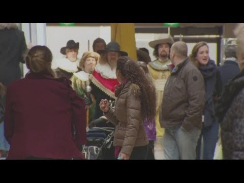 Dutch flashmob arrive at shopping mall on horses