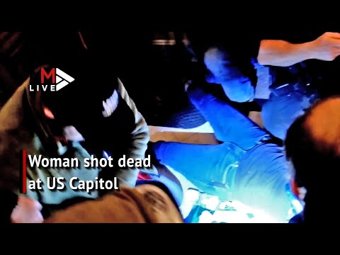 Woman shot dead as Trump supporters storm US Capitol