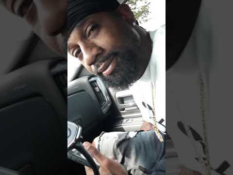 Gutta TV on the horn with Top Level Artist Flush Gotti