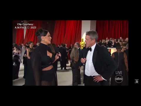 Ashley Graham Interviews Hugh Grant on The Red Carpet at The 2023 Oscars