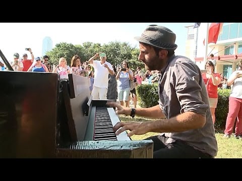 Watch Traveling Piano Man Perform 'Imagine' at Police Headquarters In Dallas