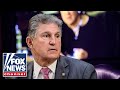 Sen. Manchin in the middle of the bipartisan infrastructure bill