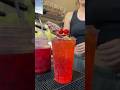a classic shirley temple 🍒❤️ made with sprite, grenadine, real lime and maraschino cherries 🫶🏼