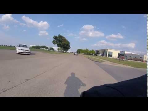 U-turn Driver Not Watching Out For Cyclist