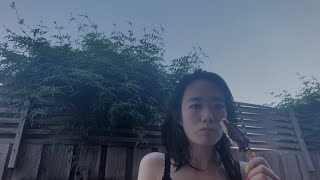 Eating a choc top on a pole