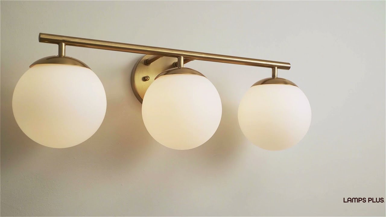 Video 1 Watch A Video About the Possini Euro Meridian Gold Frosted Glass 3 Light Bath Light