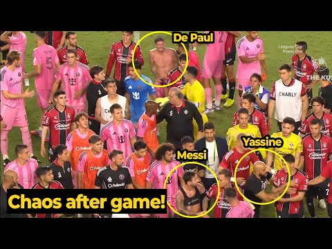 Two of Messi’s bodyguards protecting him during the post-match scuffle after the game against Atlas