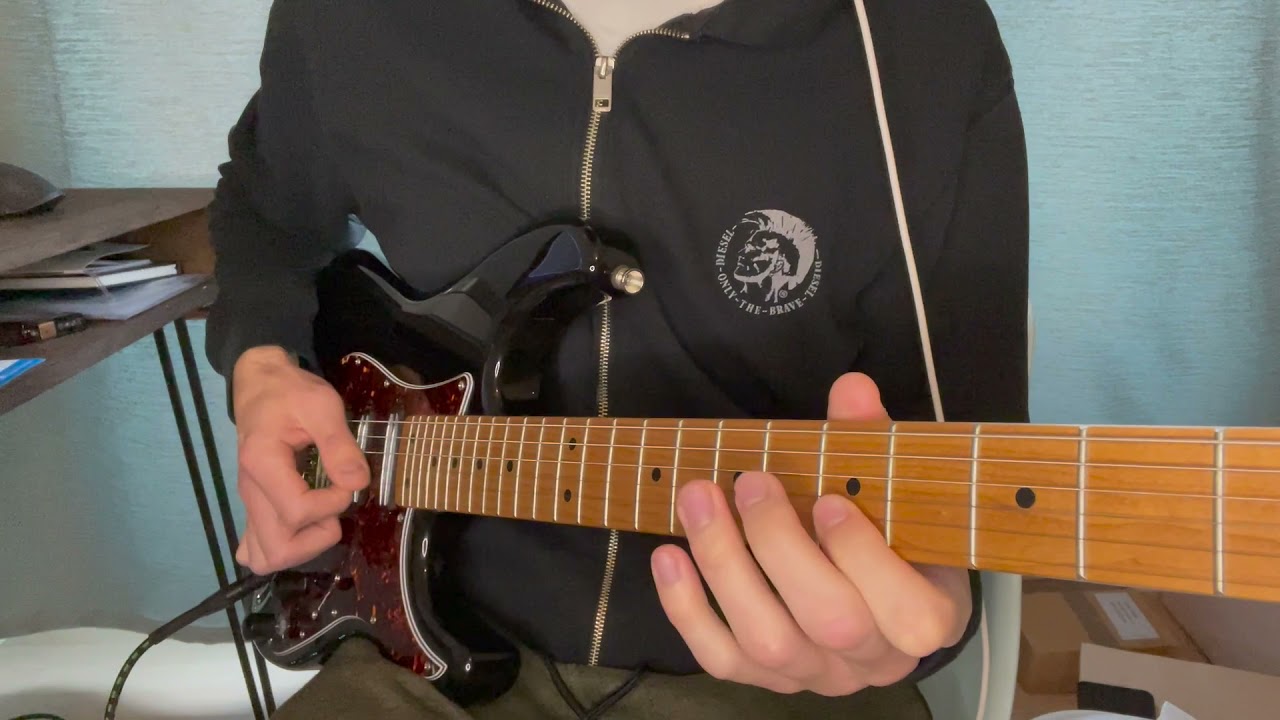 Electric guitar close-up demonstrating the Johnny B Goode intro lick double-stops