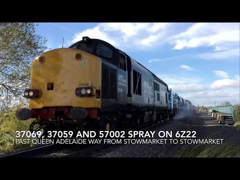 DRS 37069, 37059 and 57002 spray past Queen Adelaide Way on 6Z22