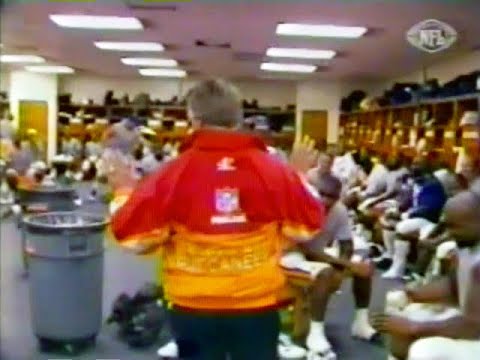 Sam Wyche of the Tampa Bay Buccaneers plays a joke on his players with Jimmy Johnson (circa 1995)