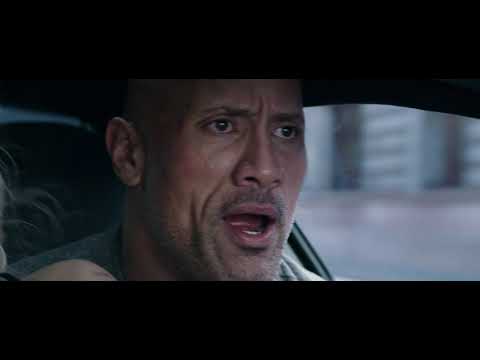 Hobbs & Shaw trailer still on Samoa night sequence with vehicles lined up