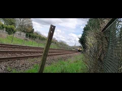 66606 hauling open hoppers out of Salisbury 