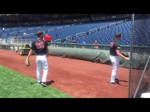 Texas Tech pitchers plays catch with fans.