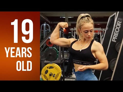 19 years old muscle girl Elvira - Biceps workout