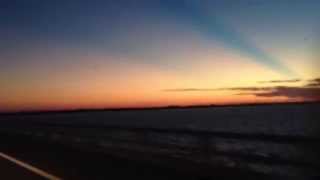 preview picture of video 'Crossing the Sanibel Causeway at Sunset 10-19-2012'