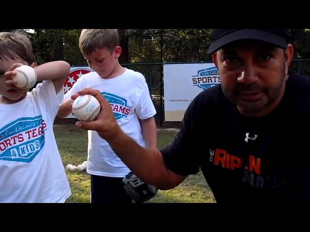 How should a 6 year old grip a baseball?