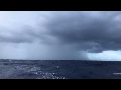 Dodging rain squalls aboard a Nautor's Swan in the North Atlantic