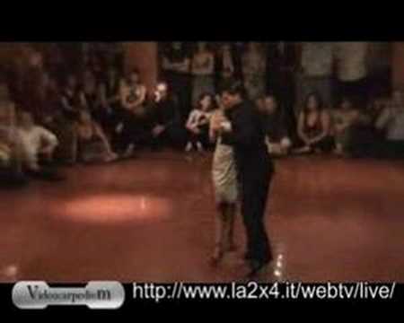  Carla Espinoza  and  Octavio Fernandez  are  dancing  to  the  milonga  "  No Hay Tierra Como La Mia  "