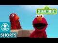 Sesame Street Elmo Pretends To Be A Chicken