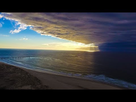 Drone footage of the sands and surf of La Salie