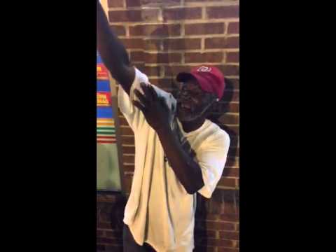 Old homeless man sings gospel in DC