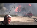 Взрыв на нефтебазе БРСМ.Горят пожарные машины и машины скорой помощи 
