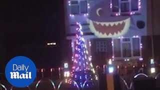 Family turn house into Baby Shark song Christmas lights display