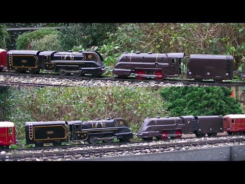 JEP Streamlined Pre-war and Post-war clockwork trains running in the garden