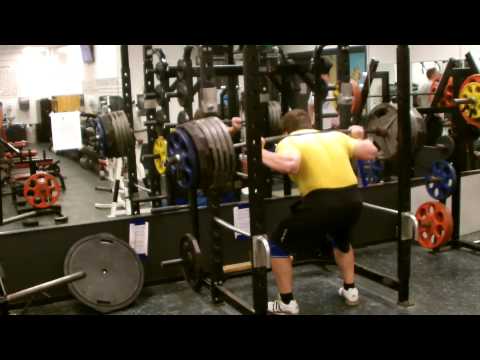 655 lbs Raw Squat, no belt or wraps. Cut high.